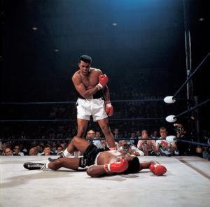 Muhammad Ali in action after first round knockout of Sonny Liston at St. Dominic's Arena, Lewiston, ME May 25, 1965.